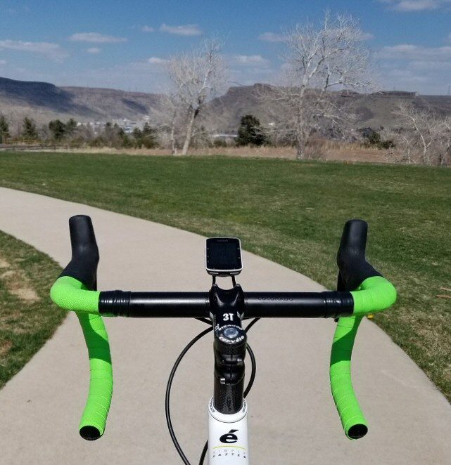 Rider's view of a 3DD drop bar on a paved path with Colorado foothills ahead